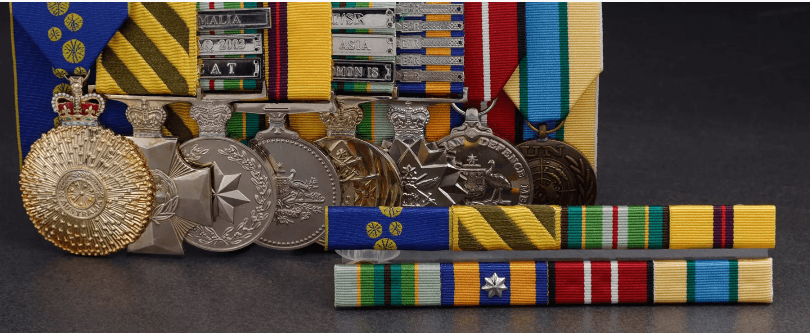 A group of medals and ribbonsDescription automatically generated