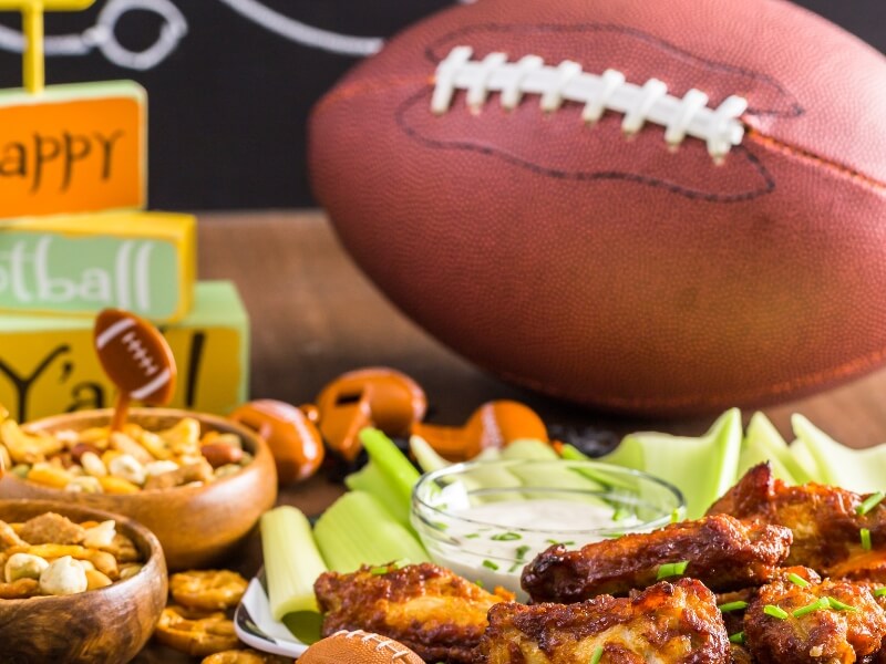 Game day snacks and a football | Tailgate Ideas for Bariatric Patients article | Celebrate Vitamins