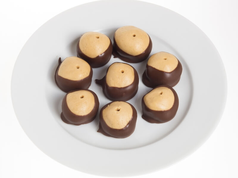 plate of peanut butter and chocolate buckeyes | Bariatric Recipes for Game Day | Celebrate Vitamins