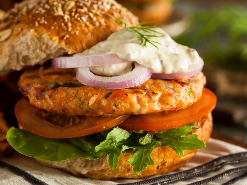 Turkey burger with aioli, tomato, red onion, and lettuce | Bariatric Recipes for Game Day | Celebrate Vitamins