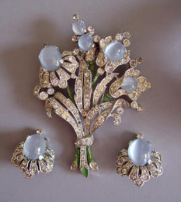 Trifari brooch and earrings with faux moonstones made from lucite