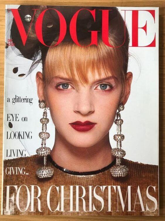 80s jewelry Uma Thurman wearing long diamond statement earrings, Vogue US, 1985