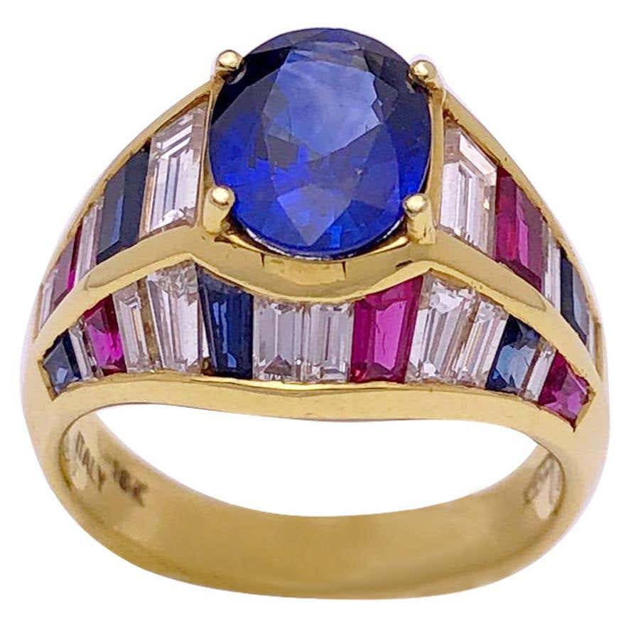 80s rings Nino Verita 18 Karat Yellow Gold Ring with Diamonds, Rubies, and Sapphires
