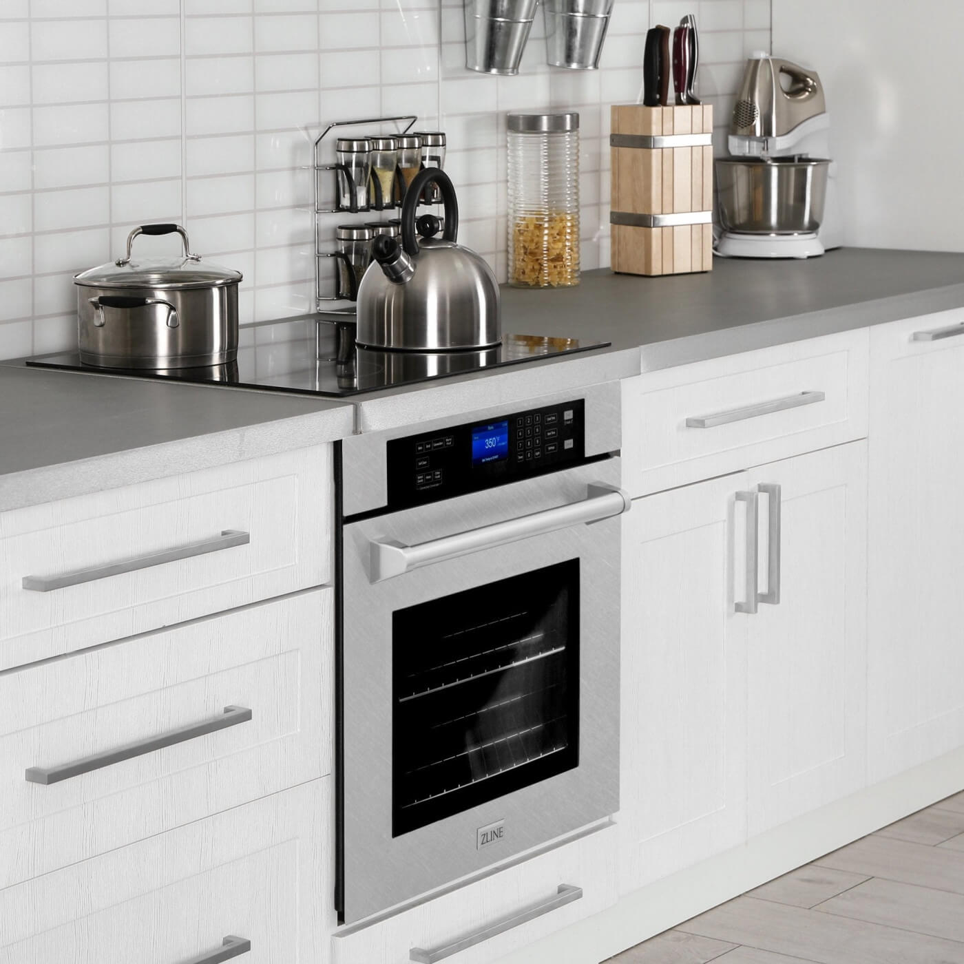 ZLINE Single Wall oven below an induction cooktop.