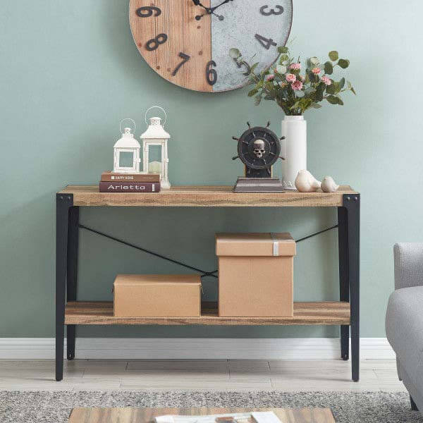 Danya B console table with decorative pieces in a living room.