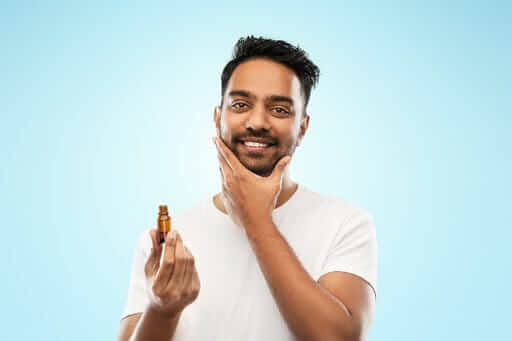 Man Applying Beard Oil | Beard Growth Oil Tips