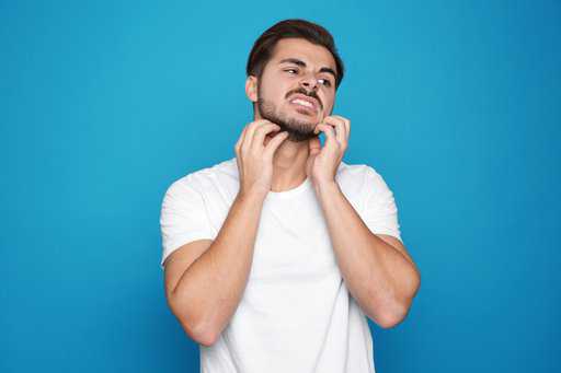 what causes beard dandruff