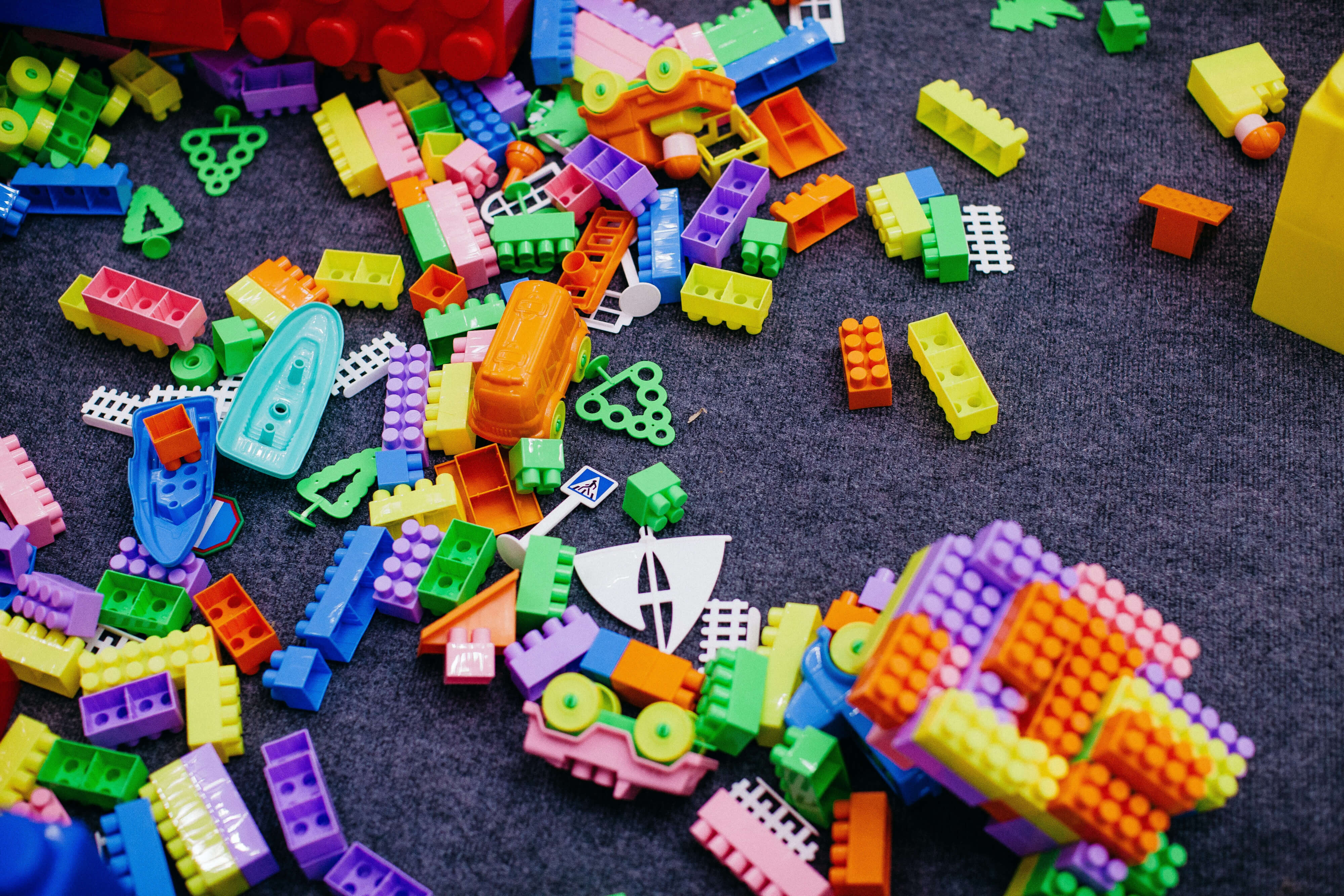 Construction toys scattered over the floor