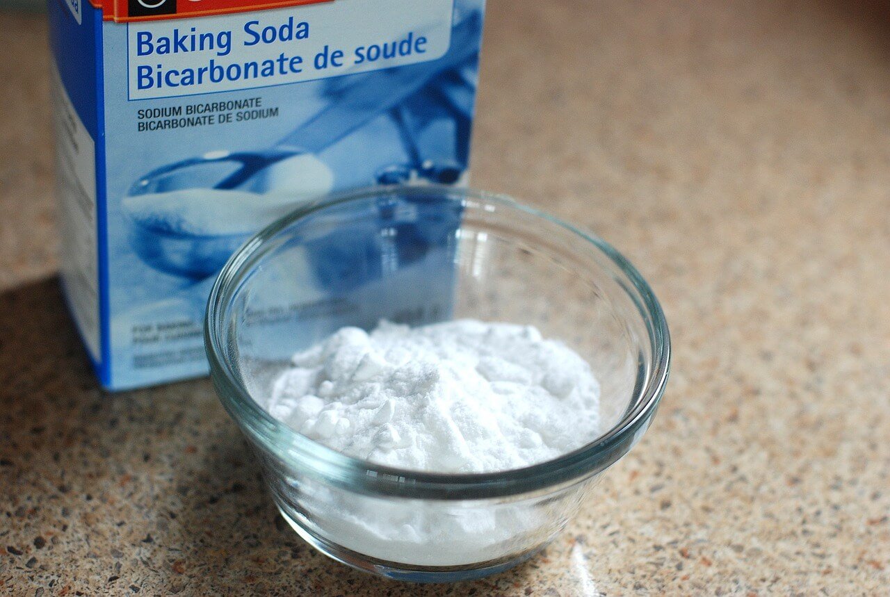 Baking soda in a small glass cup