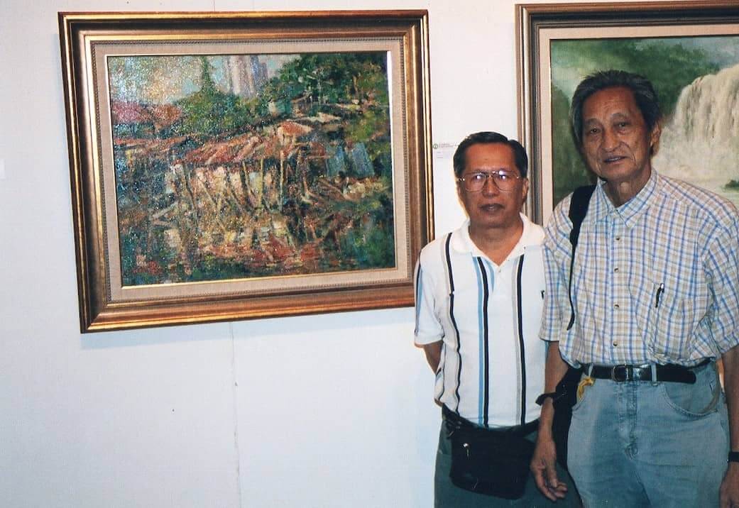 Principal Lim Yew Kuan with his student Low Hai Hong in front of Low Hai Hong's oil painting of Malacca.