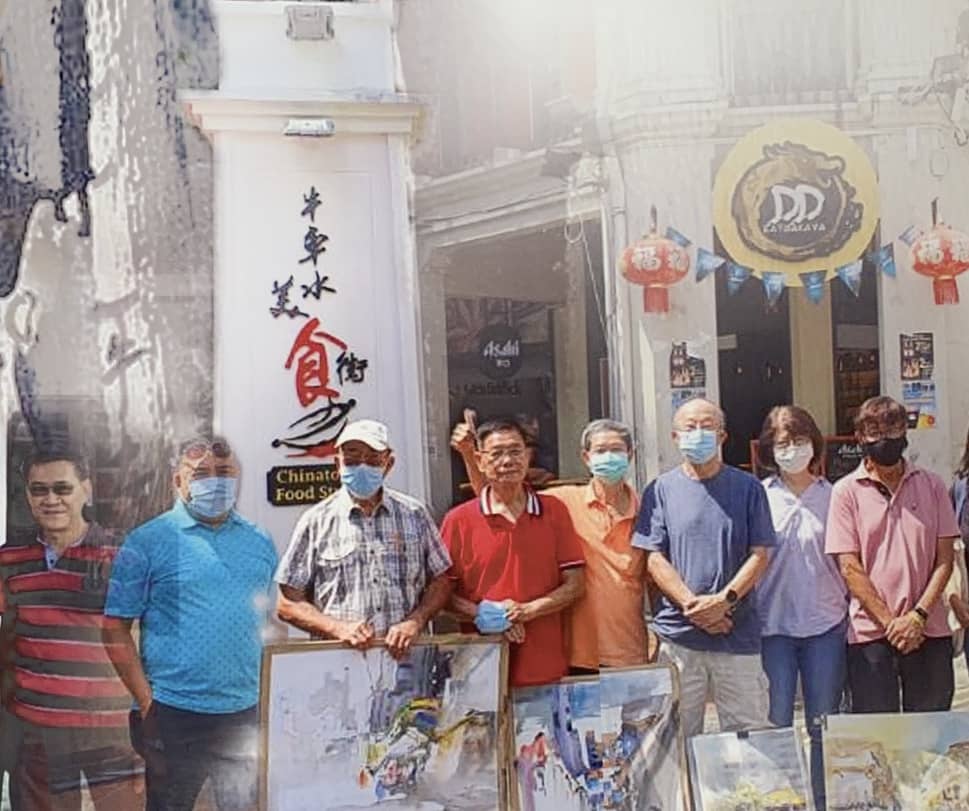 Artists of The Society of Chinese Artists painting plein-air in Chinatown in Singapore.