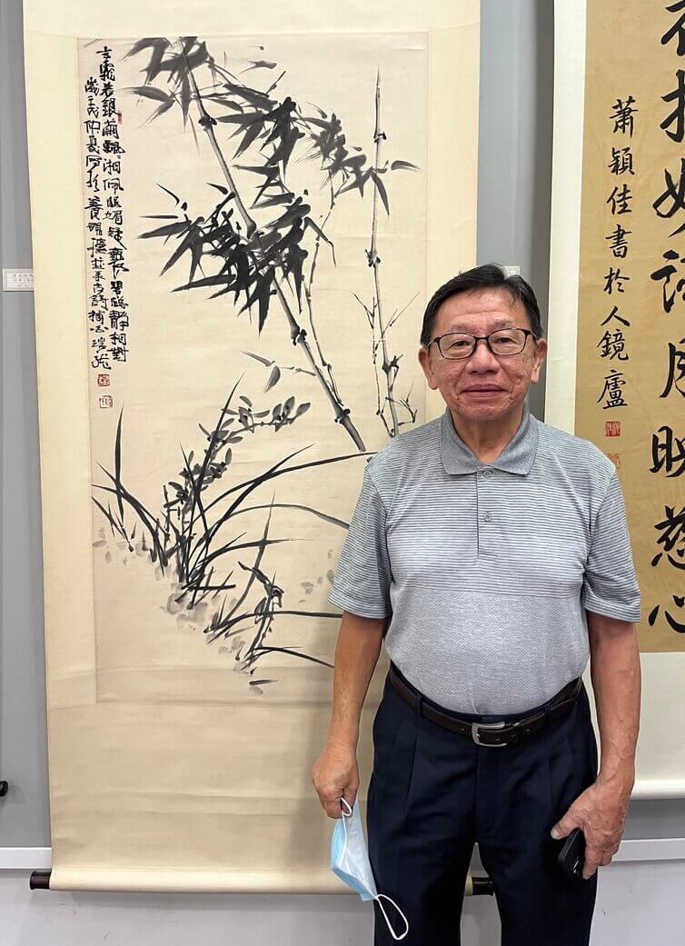 Singapore artist Nai Swee Leng with his Chinese ink painting