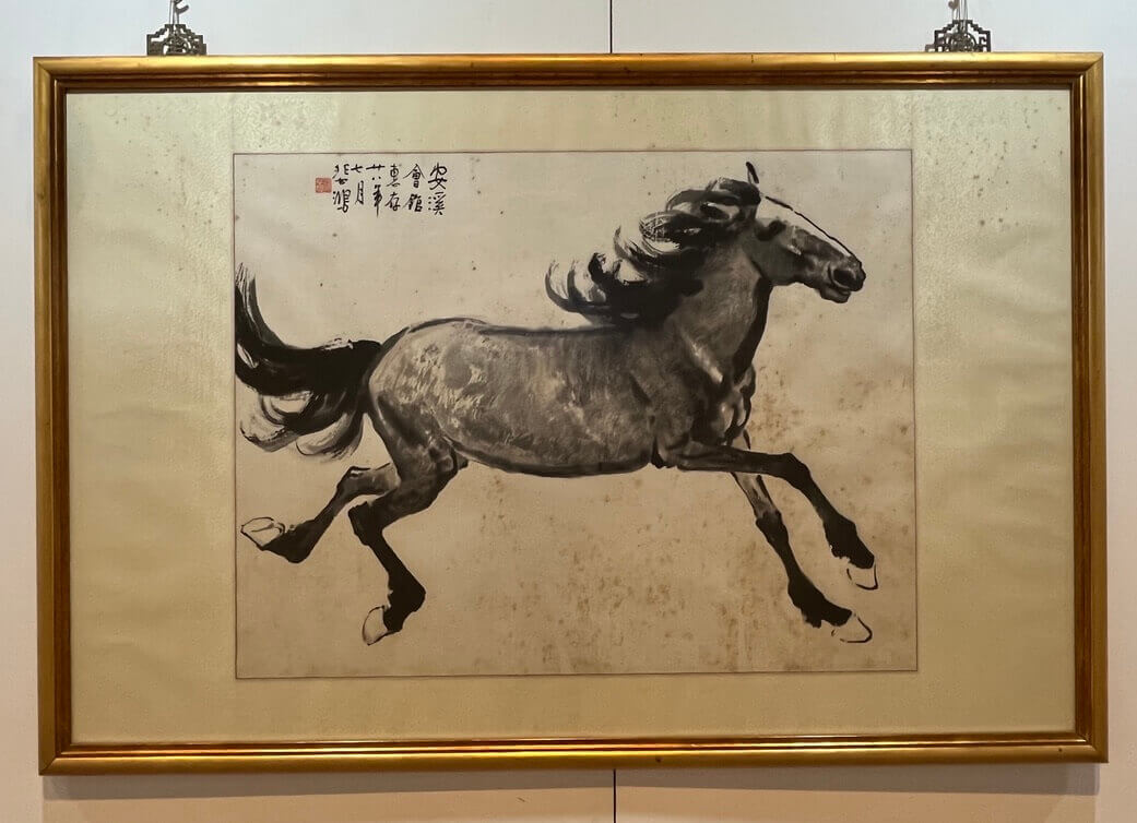 Xu Beihong's ink painting titled Galloping Horse