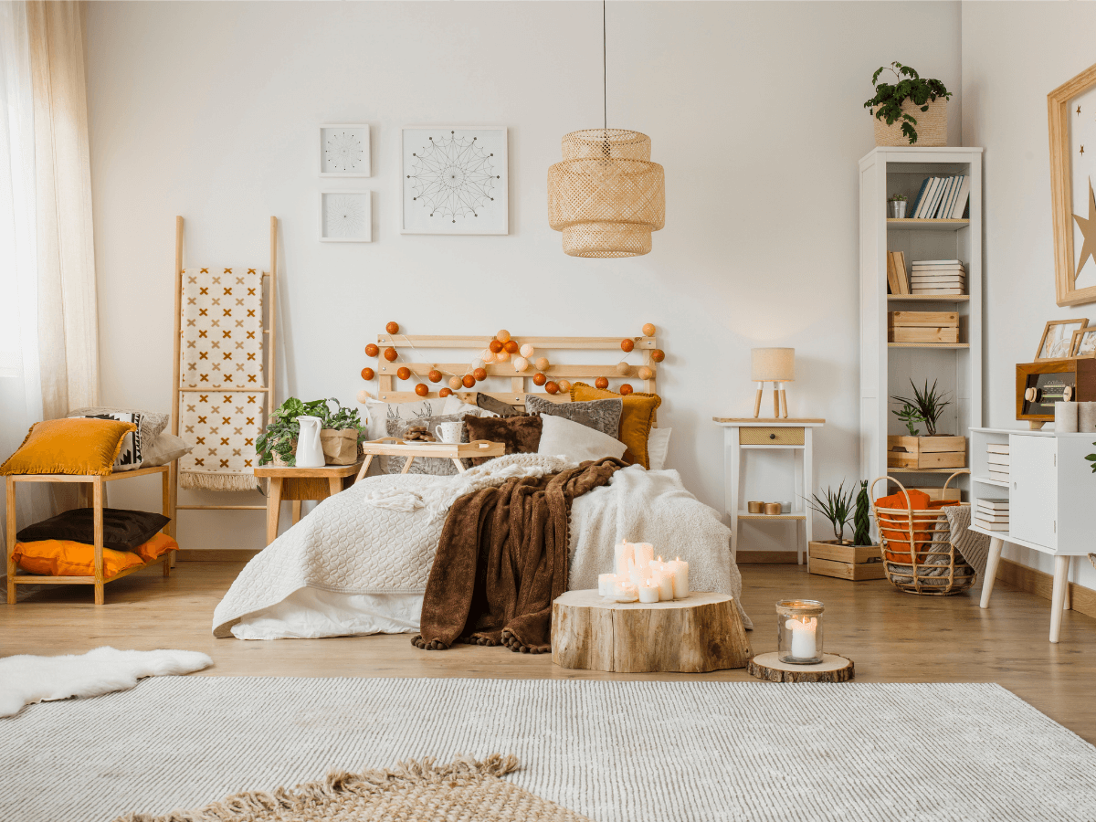 boho bedroom style with layered rugs
