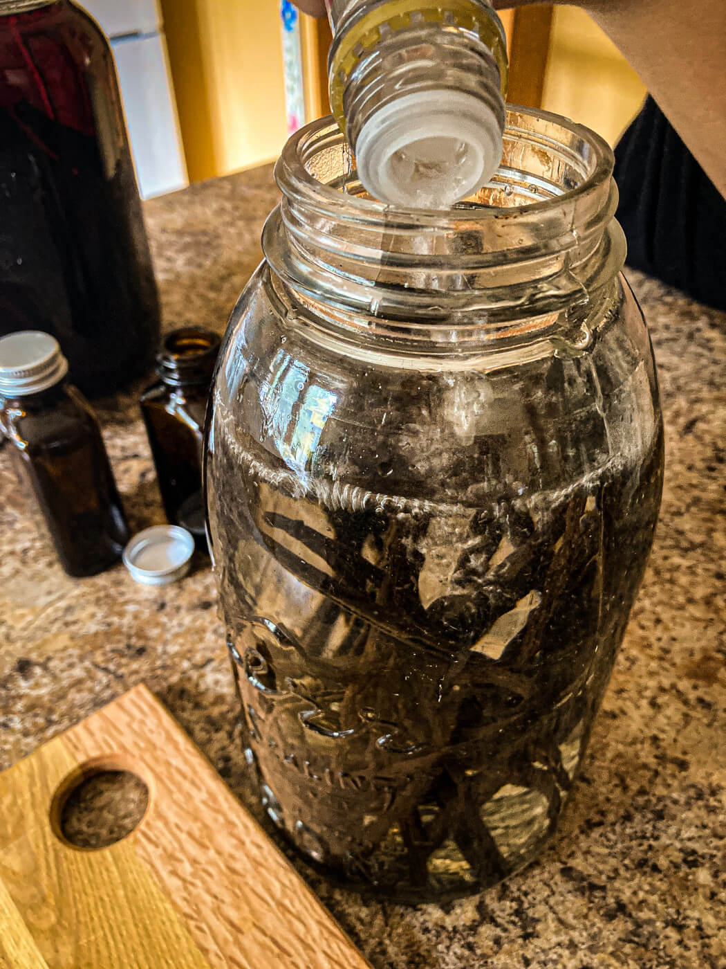 Cover vanilla beans with vodka