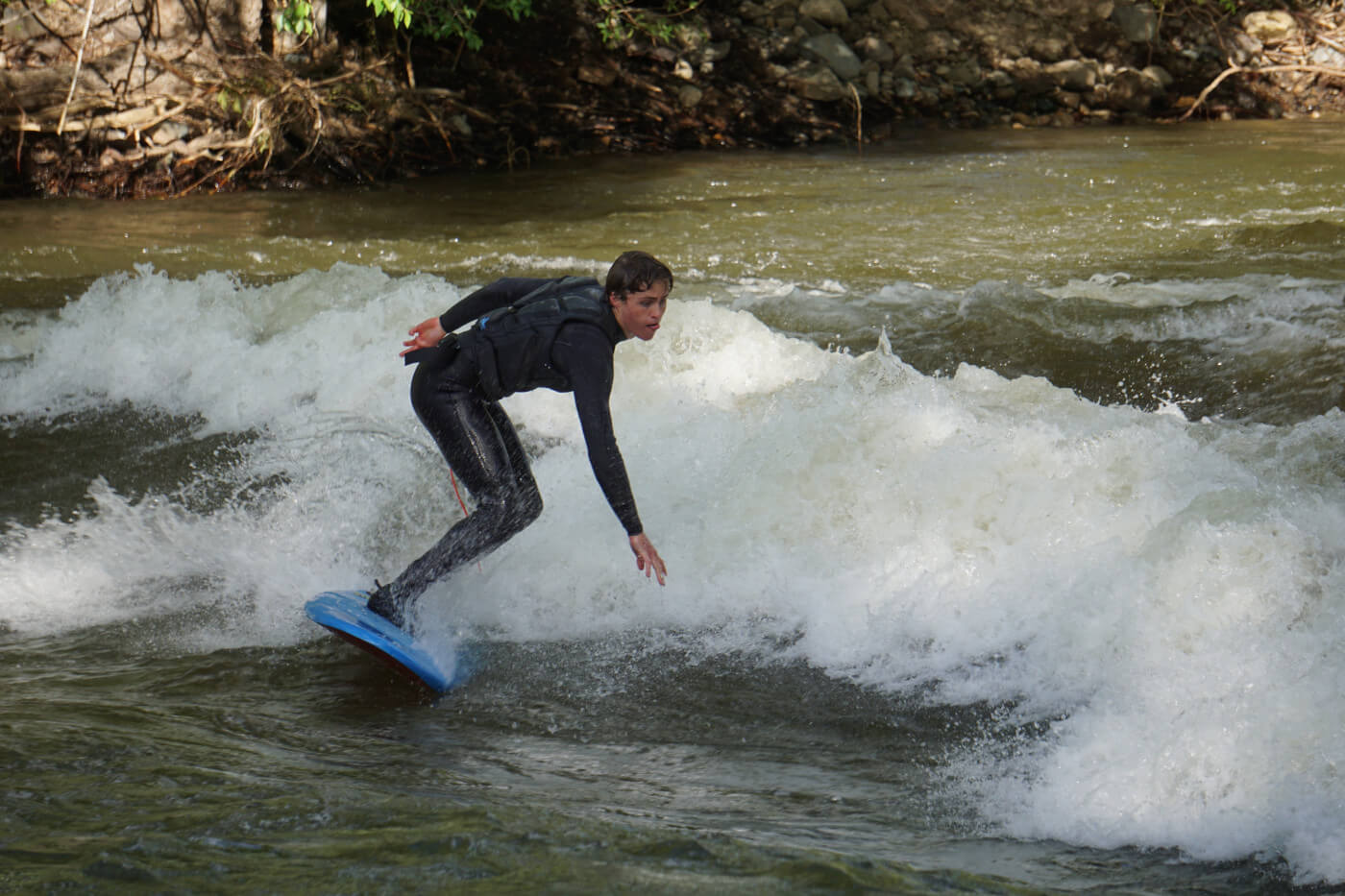 Miles Harvey surfing the original Scout Wave in Salida, CO.