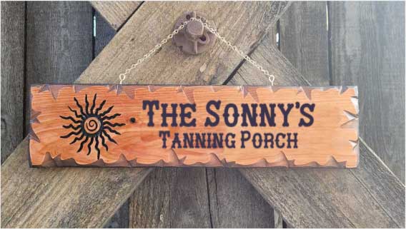 Wood sign ideas featuring a sun silhouette