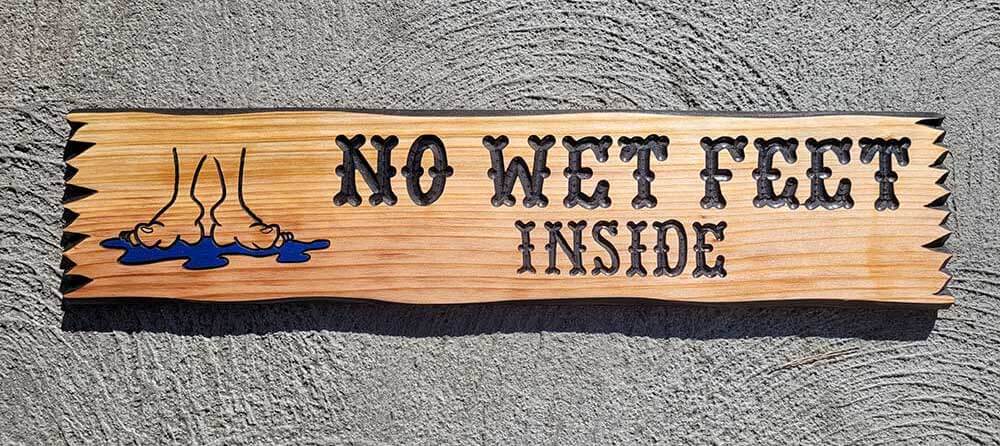 wooden welcome porch sign including wet feet