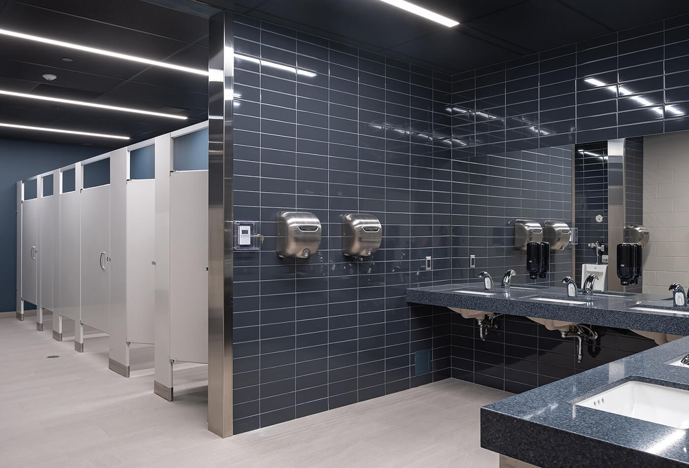 Styling a School Communal Bathrooms with Natural Stones for Safety and Beauty