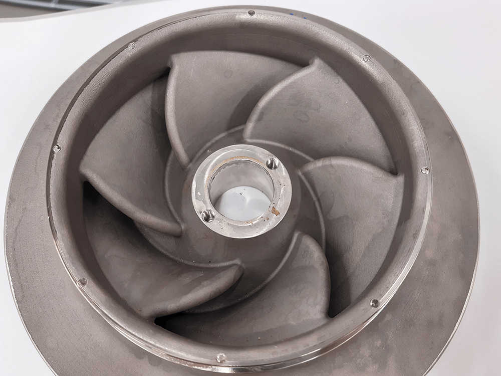 Additively manufactured pump impeller made with Amphyon