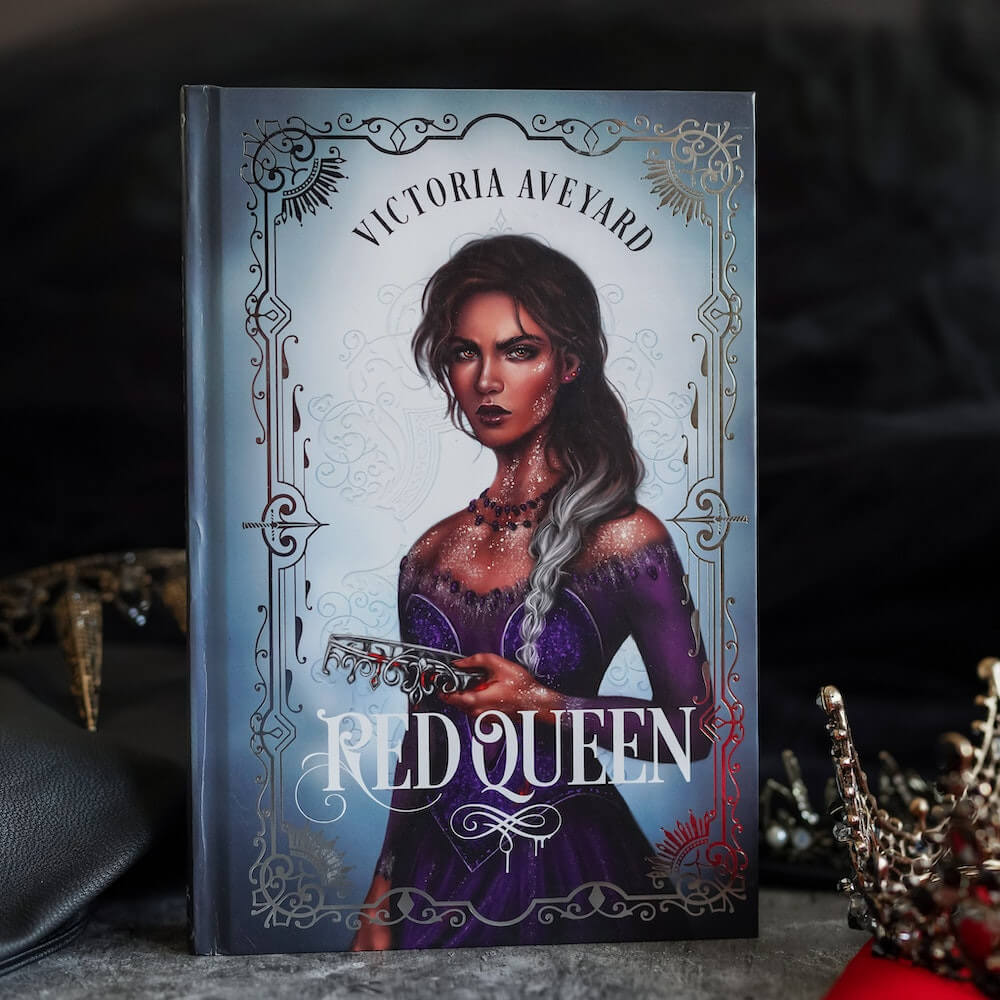 Mare Barrow on the front cover of Red Queen book 1 sold by LitJoy Crate