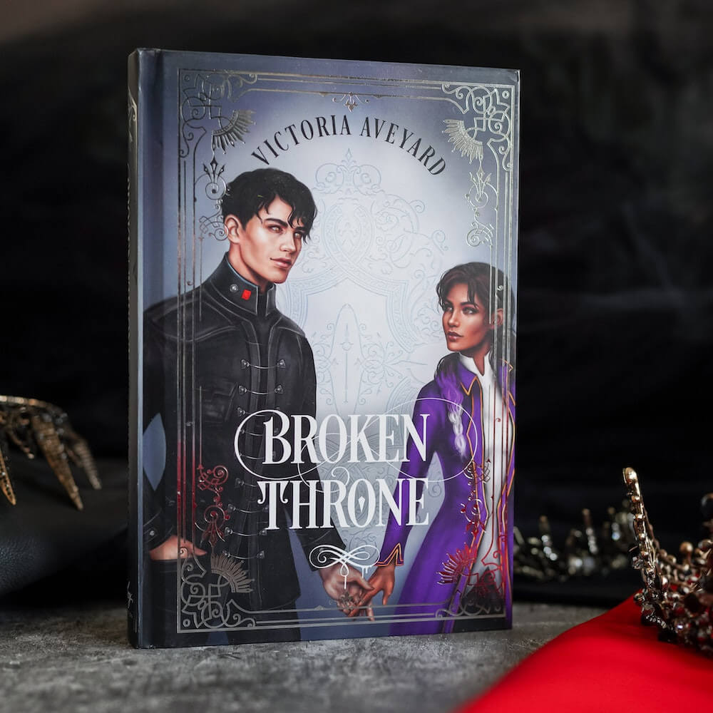 Mare and Cal on the cover of Broken Throne book 5 of The Red Queen Special Edition Box Set sold by LitJoy Crate