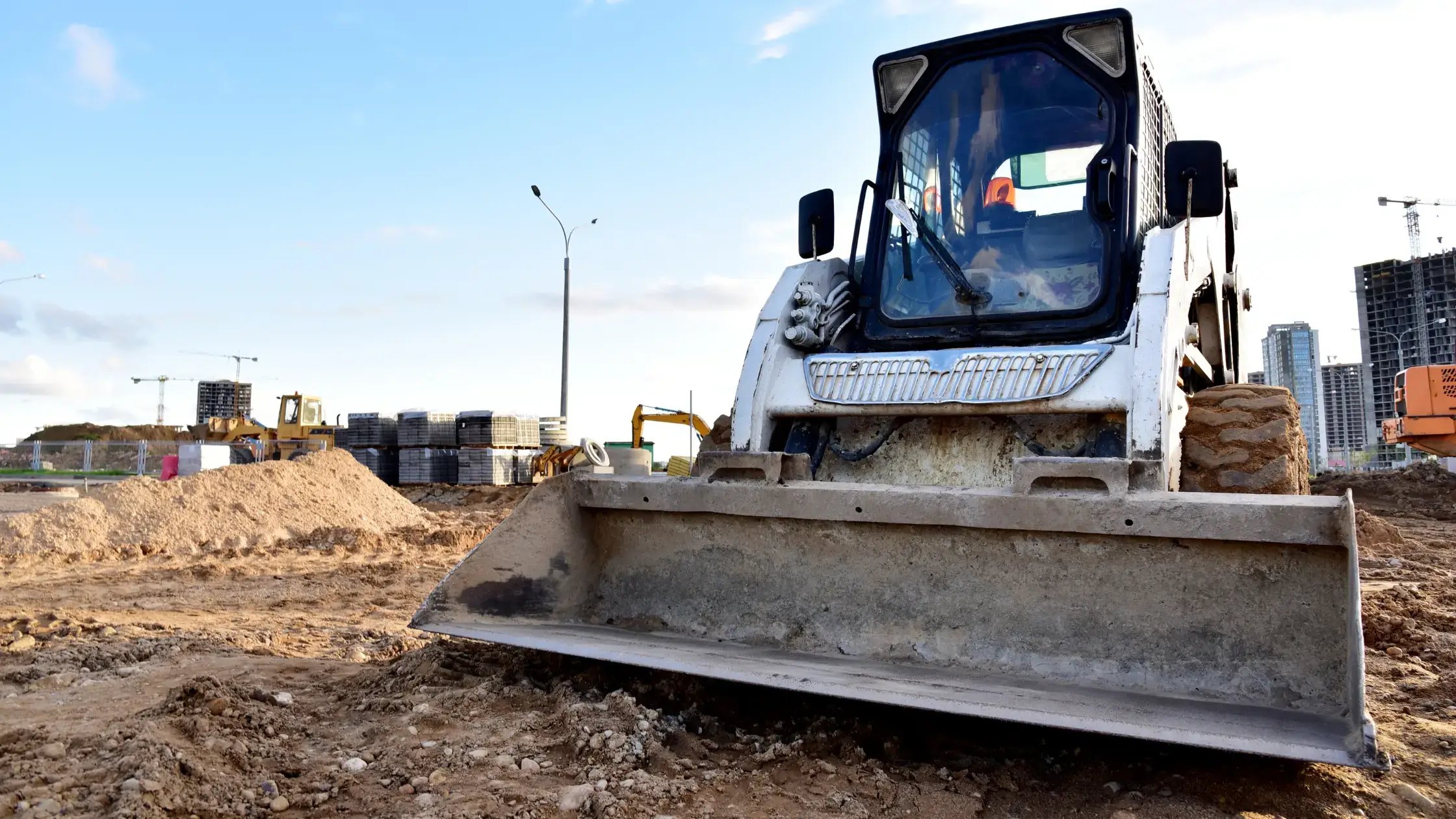 What is a Skid Steer Used For - loading and unloading works on city streets