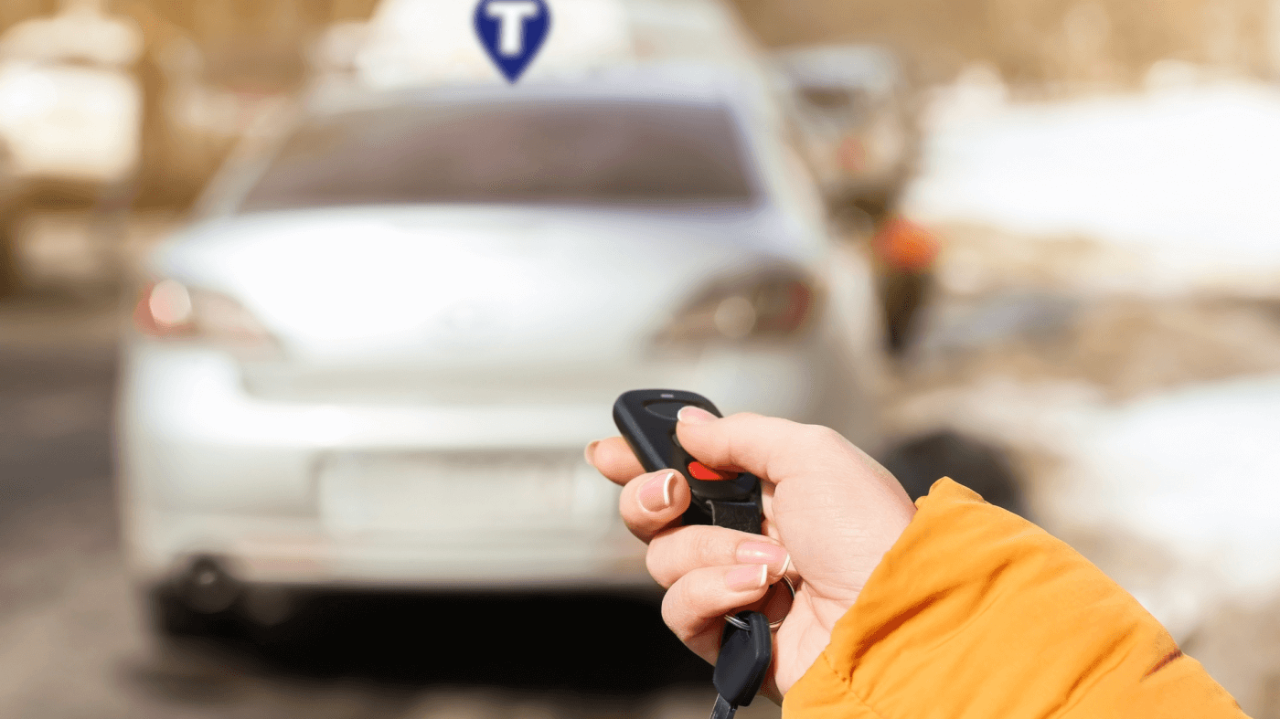 Woman locking car with gps tracking devices enabled