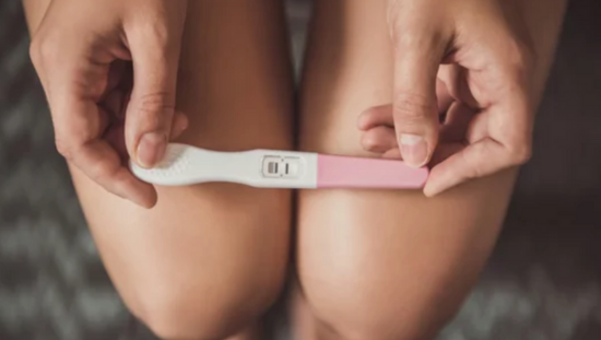 Positive pregnancy test | Is is time for a pregnancy test | Condom Depot Learning Center