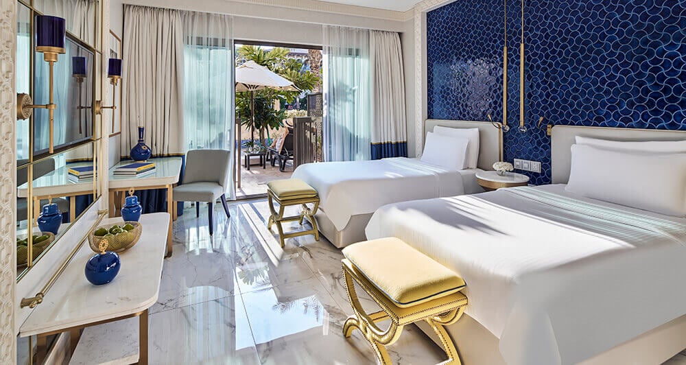 The premium room at Rixos Premium Saadiyat Island coloured in whites and royal blues