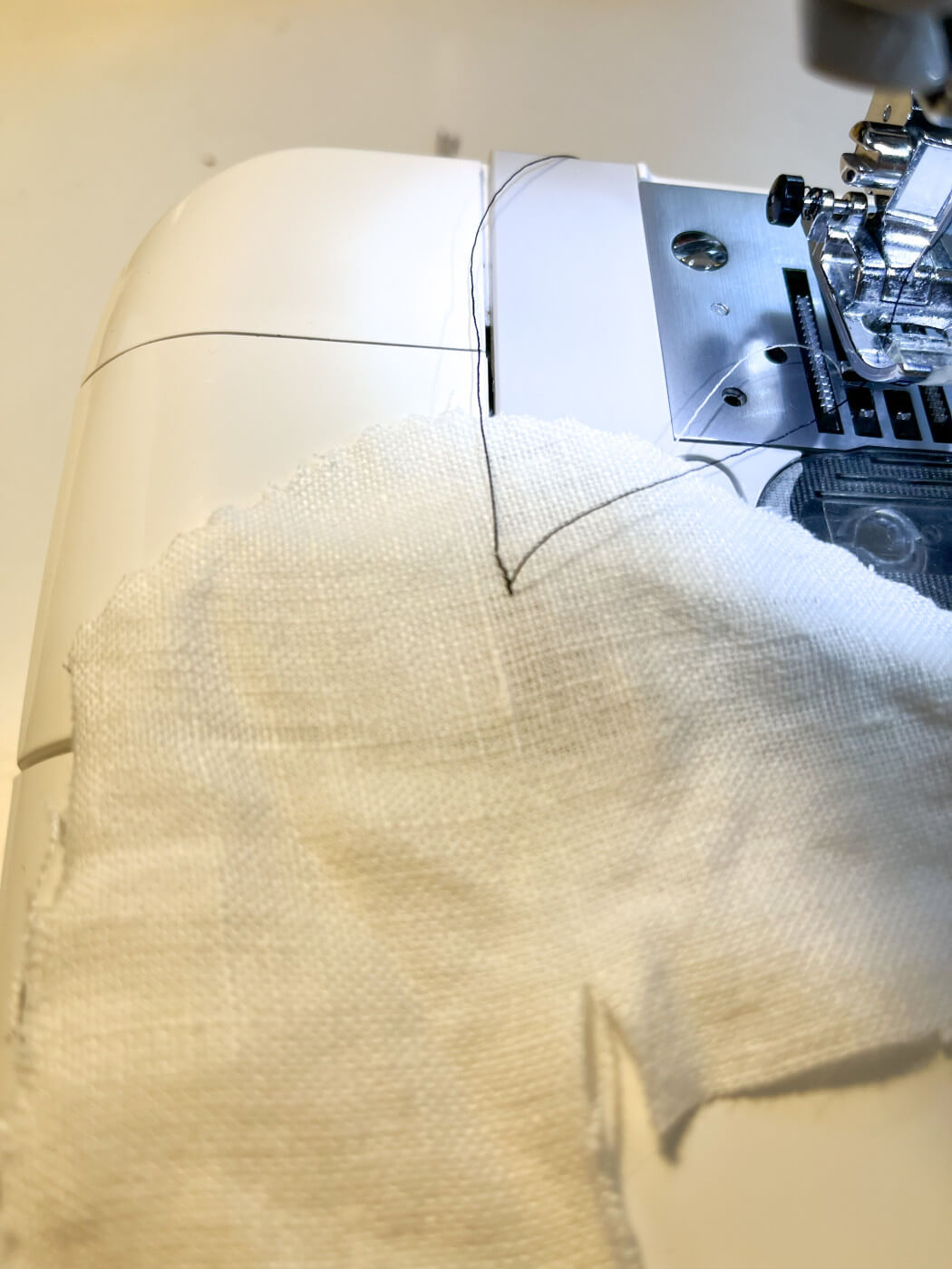 how to backstitch on a sewing machine