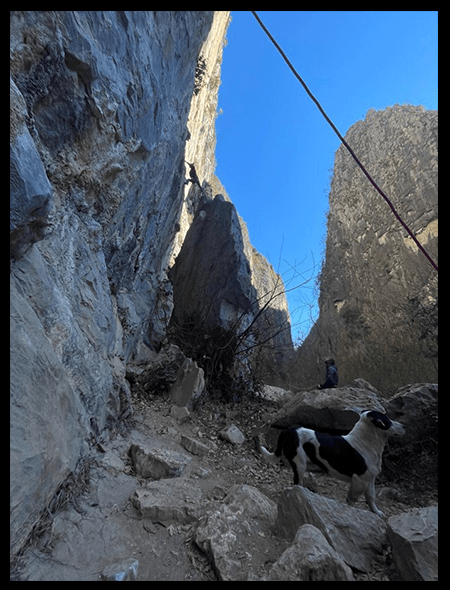 Val Shao stepping across the gap on Tecolotito, 5.11d, La Boca, El Salto